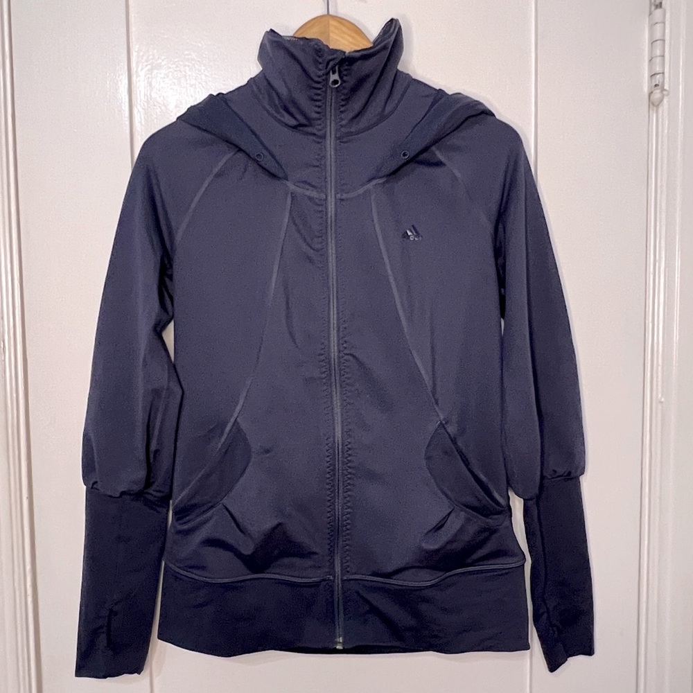 Adidas zip-up with gorgeous feminine details. Thumb holes in the sleeves. Hooded